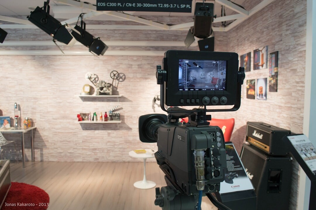 Professional TV studio with broadcast cameras and studio lighting equipment